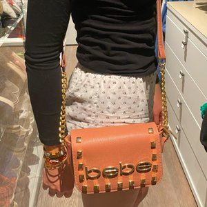 Pale pink Bebe hand purse